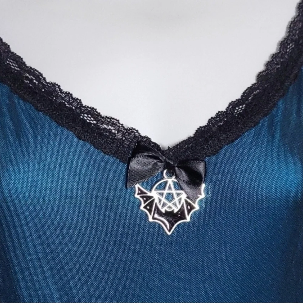 Chic Asymmetrical Teal Dress with Black Trim - Picture 3 of 9